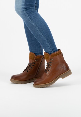 Travelin Lace-Up Ankle Boots in Brown: front