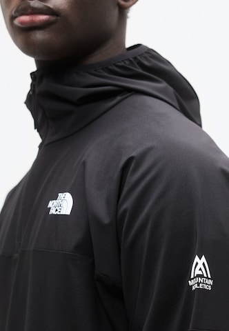 THE NORTH FACE Športna majica 'MOUNTAIN ATHLETICS USHBA' | črna barva