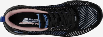 SKECHERS Sneakers in Black