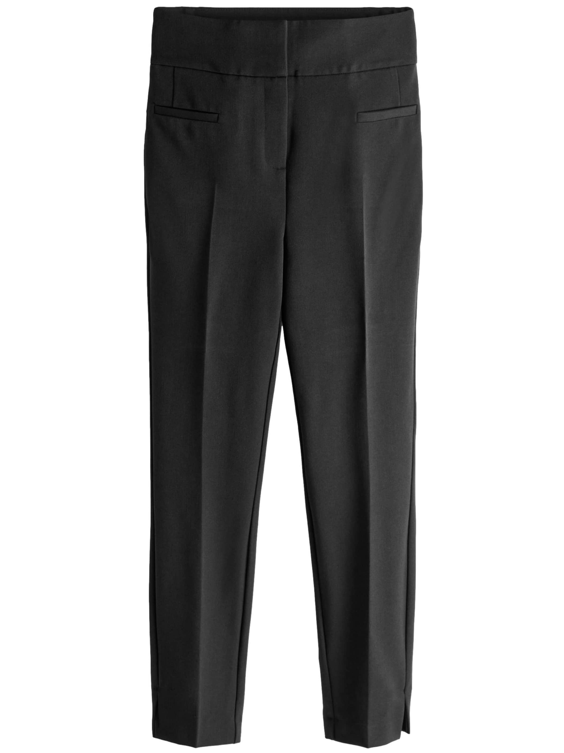 Next Skinny Pressveckad byxa i svart: framsida