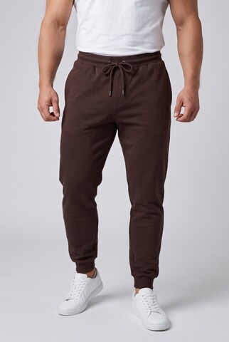 Men Plus Tapered Trousers in Brown: front