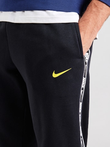 Nike Sportswear Tapered Broek in Zwart