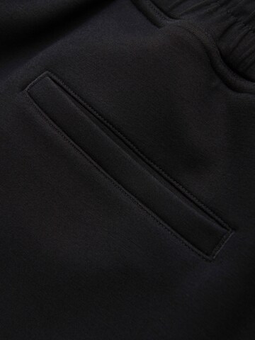 Tapered Pantaloni sportivi di Ombre in nero