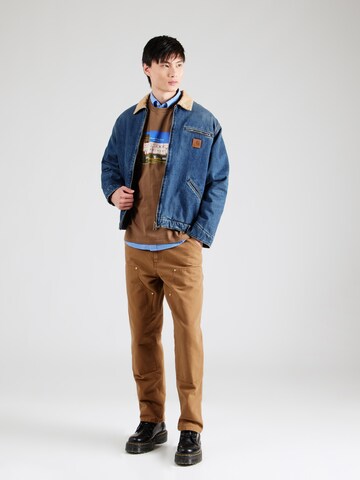 Carhartt WIP - Camiseta 'Greatest Flicks' en marrón