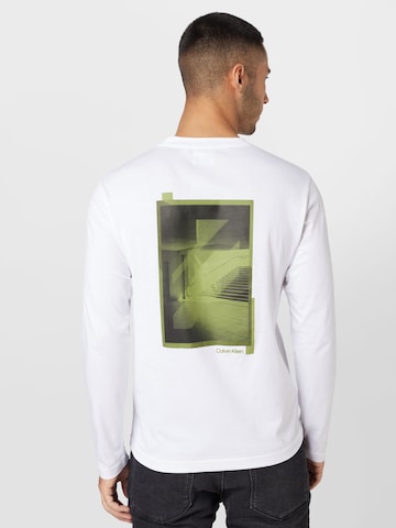 Calvin Klein Bluser & t-shirts i grå