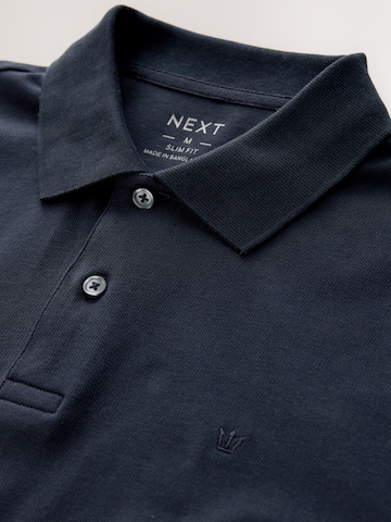 Tricou de la Next pe albastru