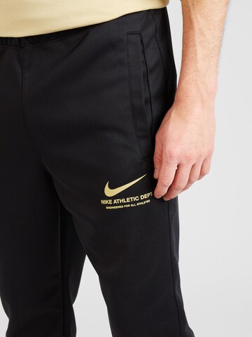 Tapered Pantaloni de la Nike Sportswear pe negru