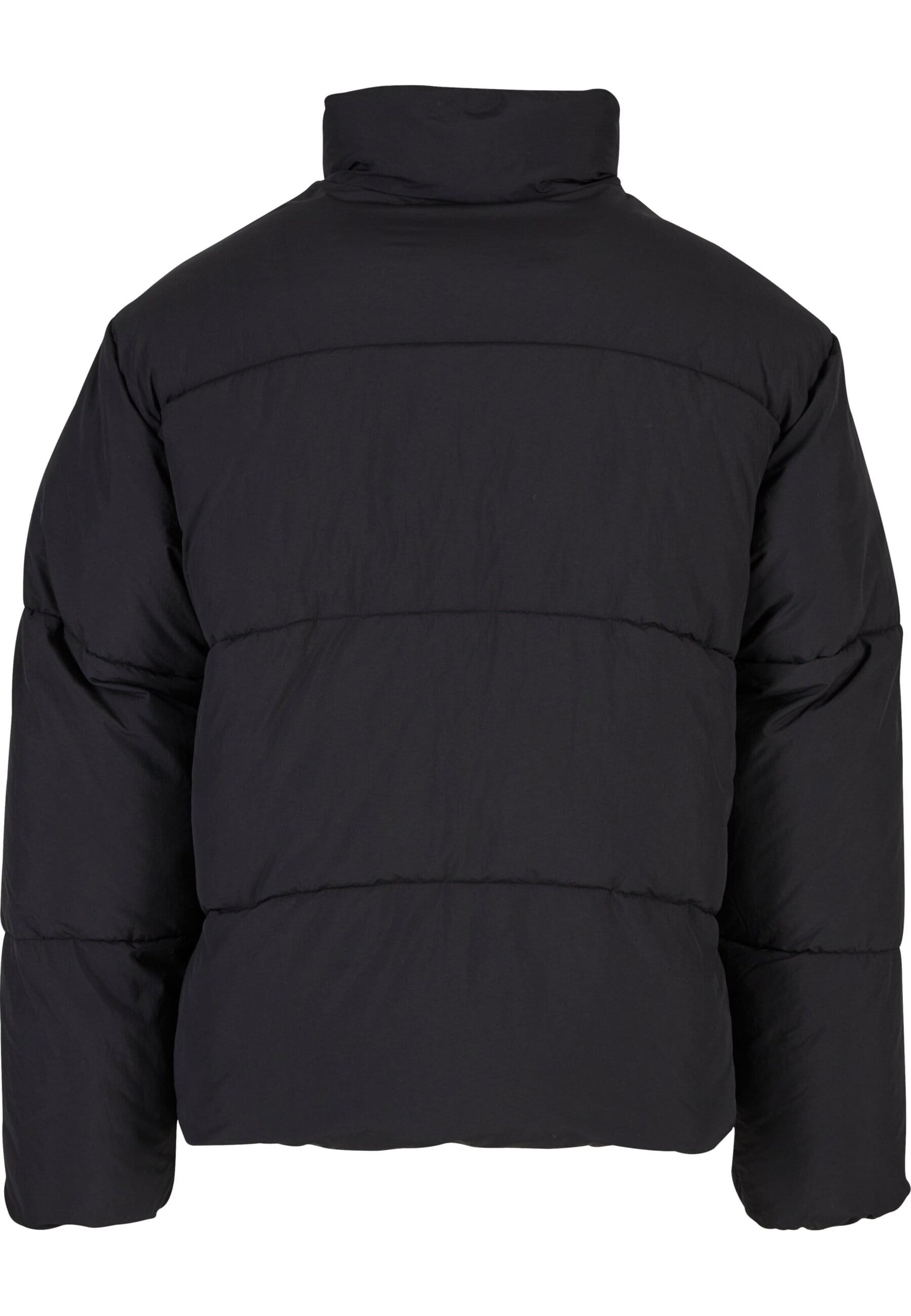 Karl Kani Winter jacket in Black: front