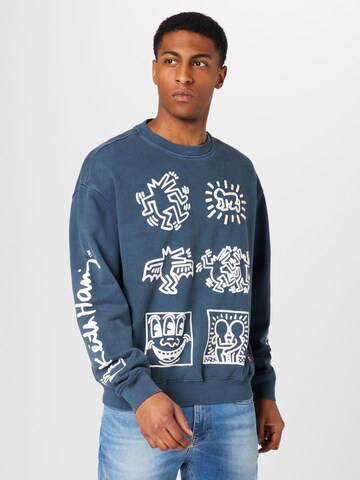 Tommy Jeans Bluzka sportowa w kolorze niebieski: przód