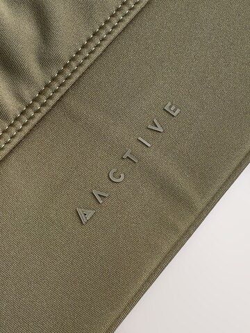 Next Bygelfri Sportbehå i grön