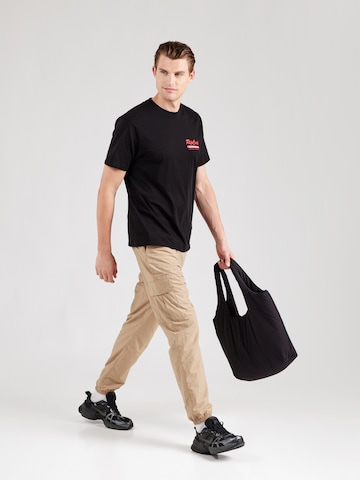 T-Shirt fonctionnel 'BOARD BAKERY' RIP CURL en noir