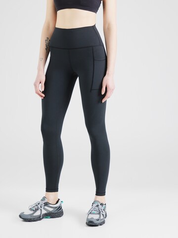 new balance Skinny Spodnie sportowe 'Essentials' w kolorze czarny: przód