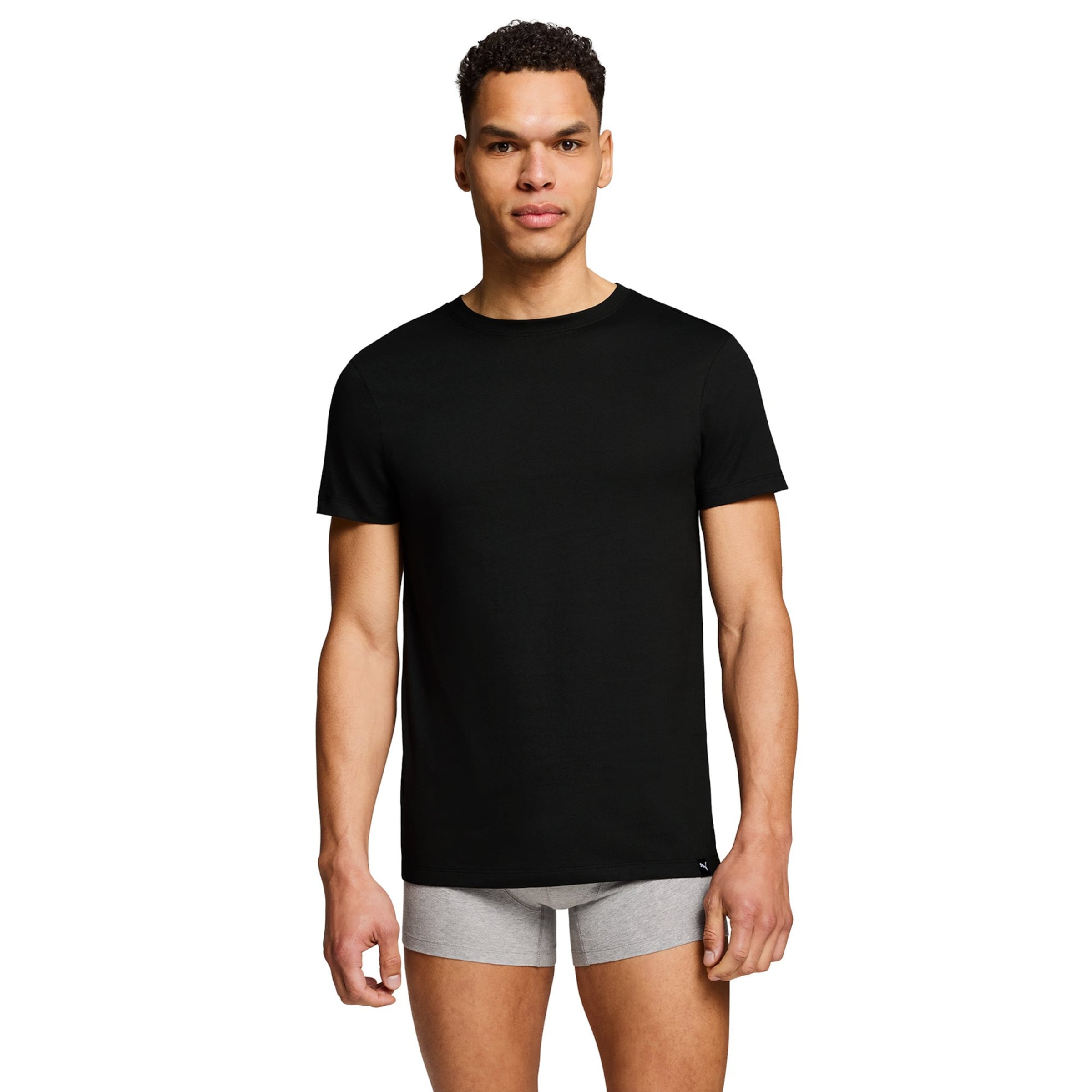 PUMA - Camiseta en negro: frente