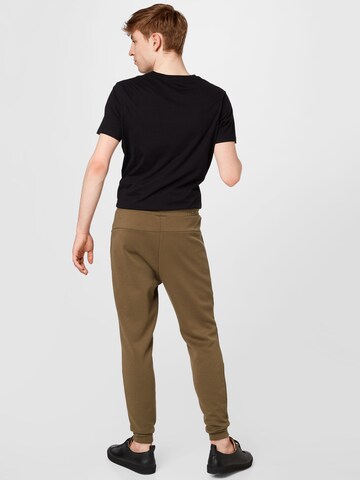 Tapered Pantaloni di Cotton On in verde