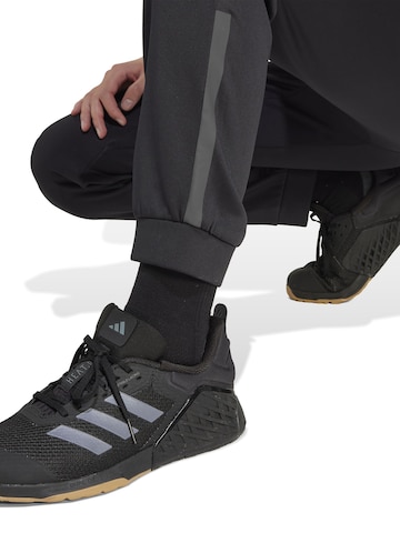 ADIDAS PERFORMANCE - Tapered Pantalón deportivo en negro