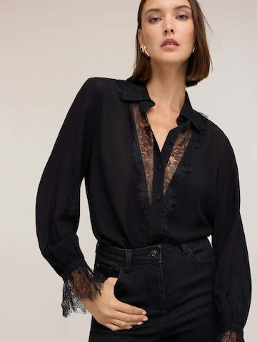 MOTIVI - Blusa en negro