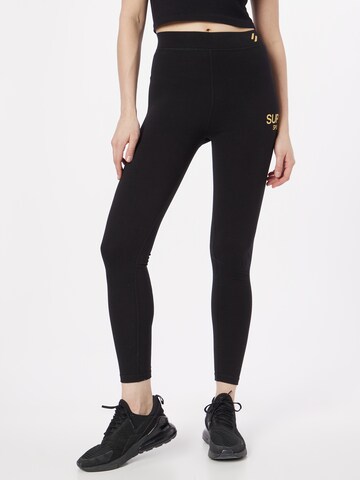 Superdry Skinny Leggings in Black: front