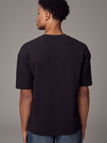 Next - Camiseta en negro
