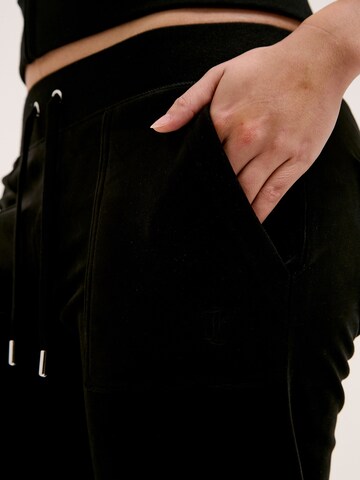 Skinny Pantaloni sportivi di Juicy Couture in nero