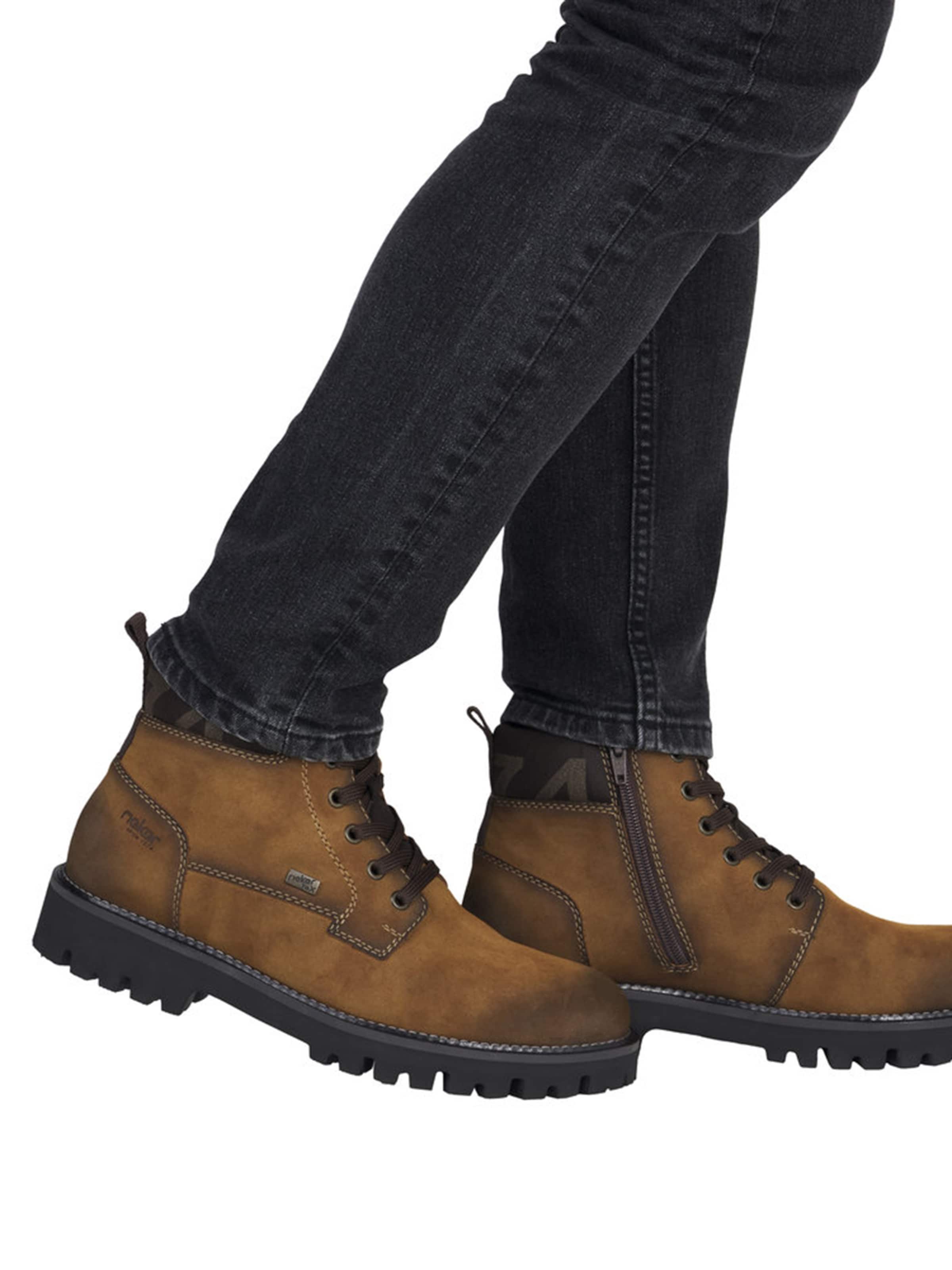 Rieker - Botas con cordones en marrón