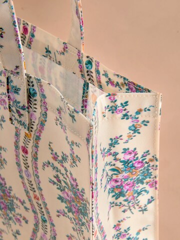 Plase de cumpărături de la Cath Kidston pe mai multe culori