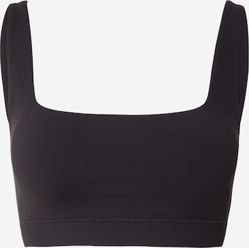 Soutien-gorge de sport Fabletics en noir : devant