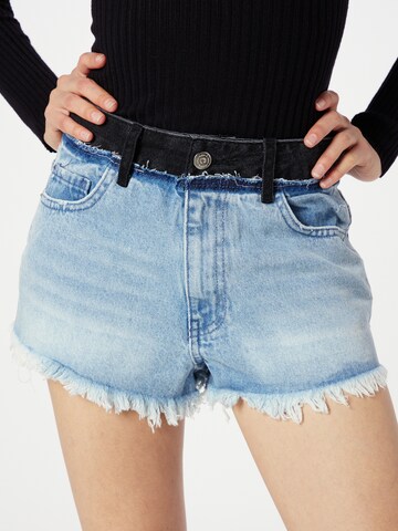 Regular Jeans de la Koton pe albastru