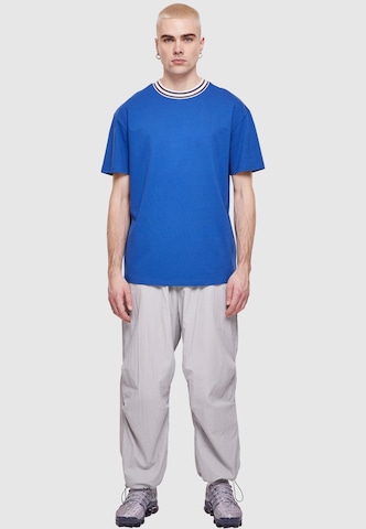 Urban Classics - Camiseta 'Kicker' en azul