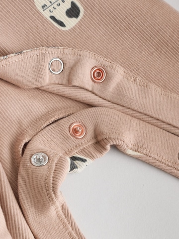 Tutina / body per bambino di Next in beige