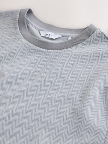 T-Shirt Next en gris