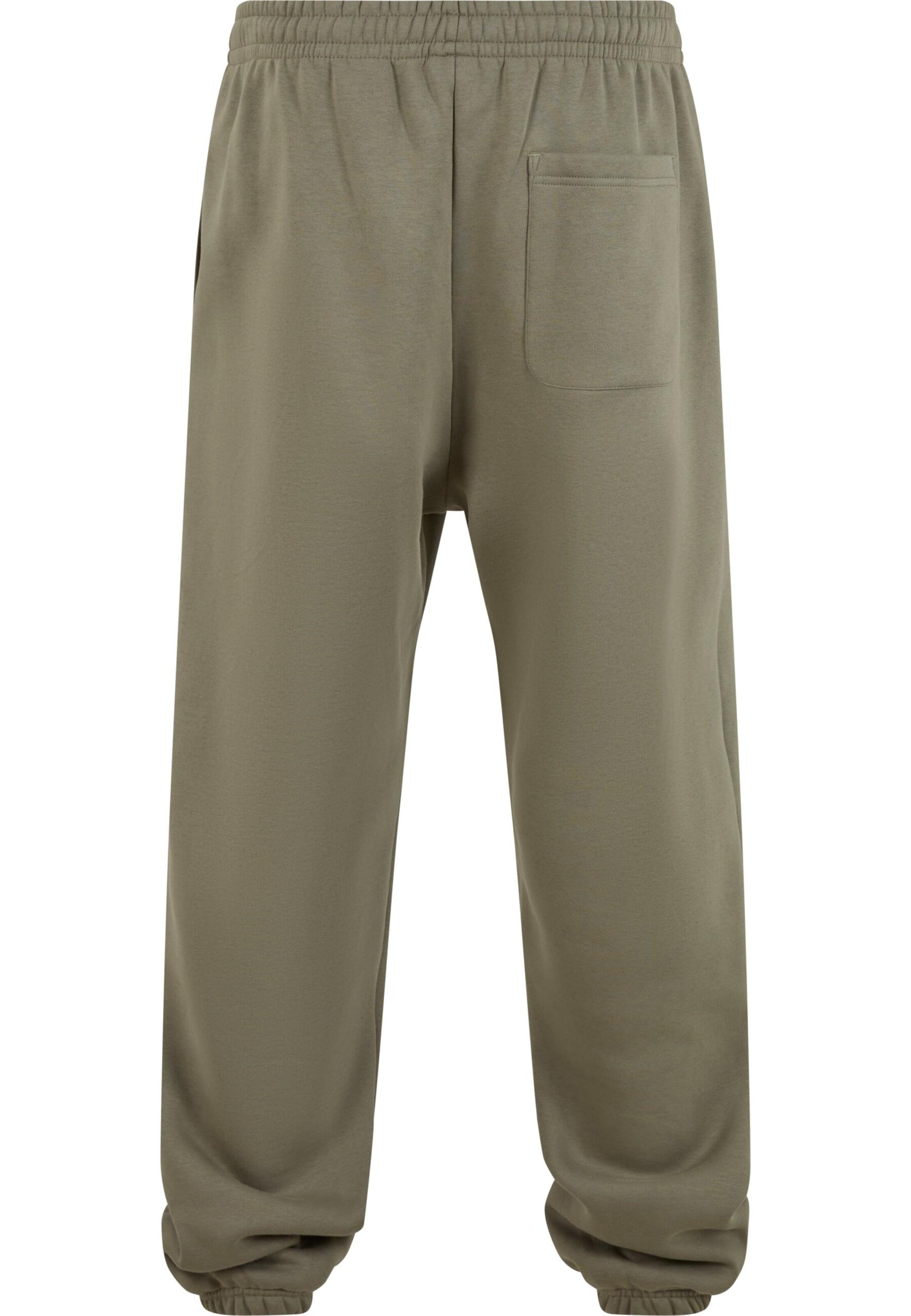 Urban Classics Конический (Tapered) Штаны в Зеленый