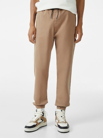 Loosefit Pantalon Bershka en beige : devant