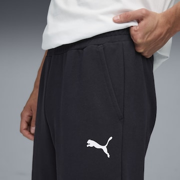 PUMA Tapered Sportbroek in Zwart