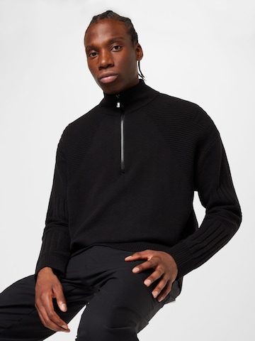 Pull-over Calvin Klein en noir : devant