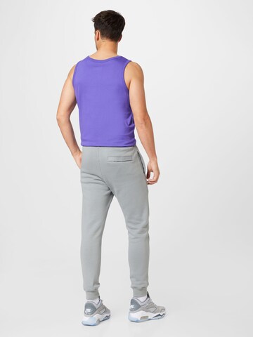 Nike Sportswear Zúžený Kalhoty 'Club Fleece' – šedá