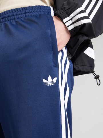 ADIDAS ORIGINALS Štandardný strih Nohavice 'SST' - Modrá