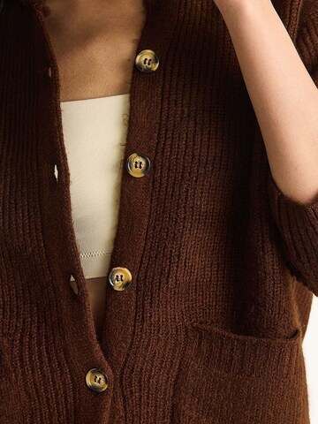 Cardigan Bianco Lucci en marron