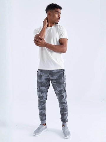 Tommy Life - Skinny Calças de desporto em cinzento