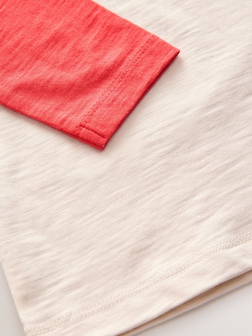 T-Shirt Next en blanc