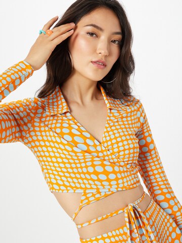 ABOUT YOU x Antonia Blouse 'Irina' in Orange