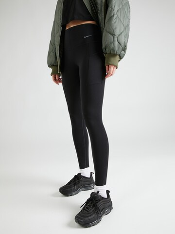 Skinny Pantalon de sport 'UNIVERSA' NIKE en noir : devant