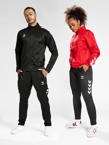 Hummel Regular Sports trousers 'CORE XK TRAINING POLY' in Black