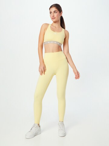ADIDAS SPORTSWEAR Skinny Workout Pants 'Studio' in Yellow