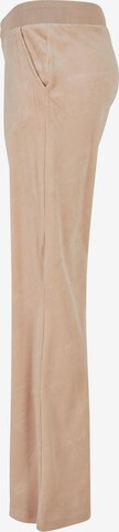 Flared Pantaloni di FUBU in beige