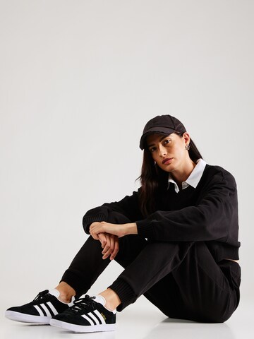 Calvin Klein Jeans Tapered Trousers in Black
