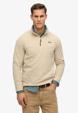 Pull-over Superdry en beige : devant