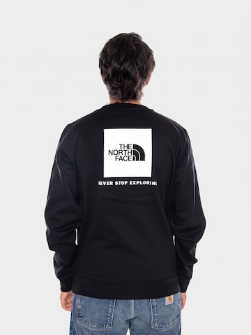 Sweat-shirt 'M EVO BOX NSE REG CREW TNF BLACK' THE NORTH FACE en noir