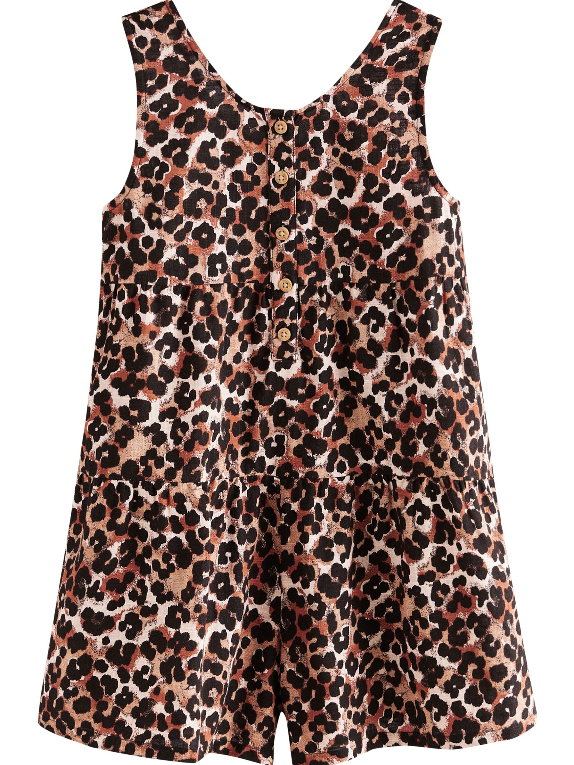 Next Overall i brun: forside