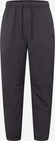 Slimfit Pantaloni de la Nike Sportswear pe negru: față