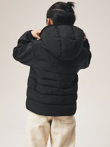 Superdry & Co Tussenjas in Zwart